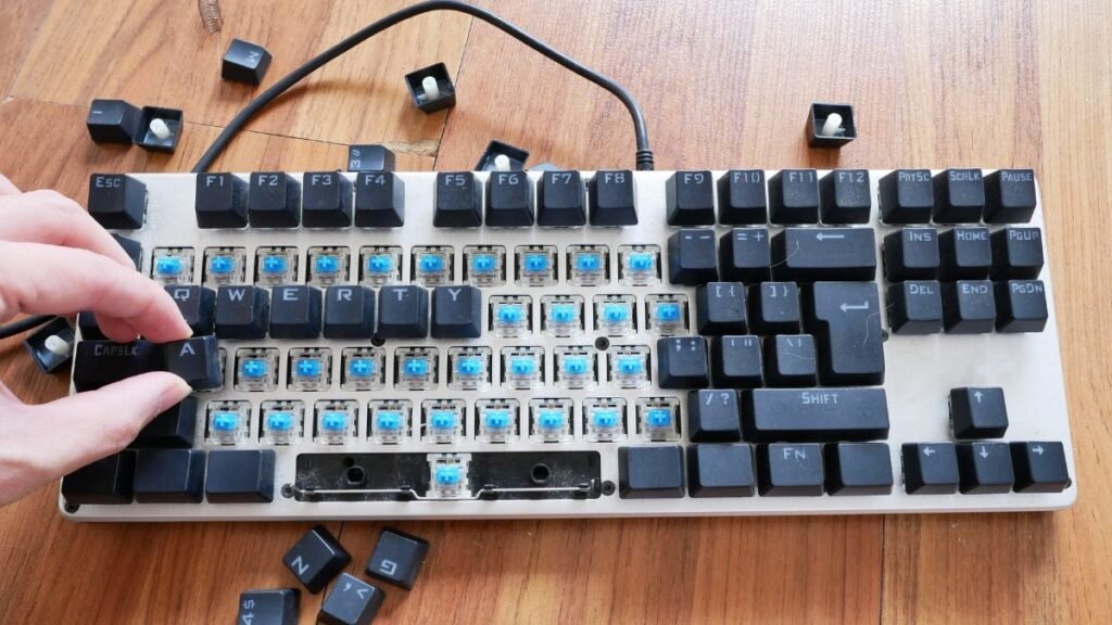 Close-up view of a mechanical gaming keyboard switch under a removed keycap